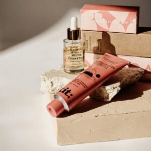 Close-up of skincare products elegantly arranged in warm sunlight showcasing natural beauty and cosmetics.